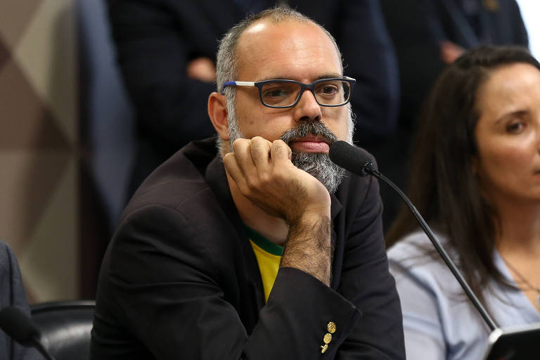 Influenciador bolsonarista Allan dos Santos durante depoimento à CPMI das Fake News
