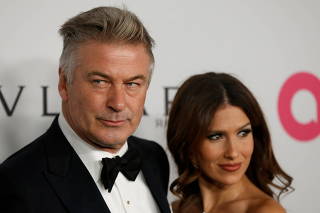 FILE PHOTO:  Actor Alec Baldwin and his wife Hilaria Baldwin pose on the red carpet during the commemoration of the Elton John AIDS Foundation 25th year fall gala at the Cathedral of St. John the Divine in New York City