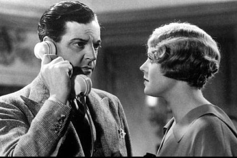 Os atores Leslie Banks e Edna Best em "O Homem que Sabia Demais" (1934)