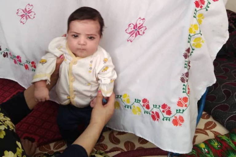 Sohail Ahmadi, com cerca de dois meses, em uma foto feita em agosto de 2021, em Cabul
