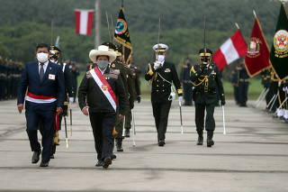 Peru's newly-elected Socialist President Pedro Castillo attends a military parade, in Lima