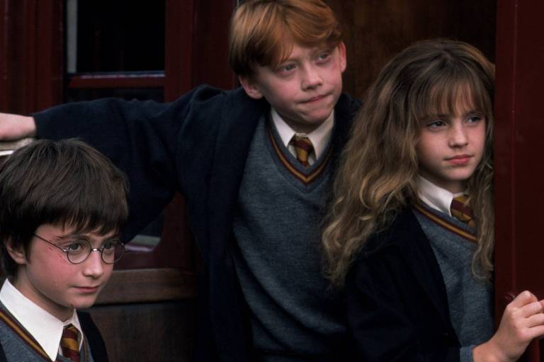 Daniel Radcliffe, Rupert Grint e Emma Watson em cena de 'Harry Potter'
