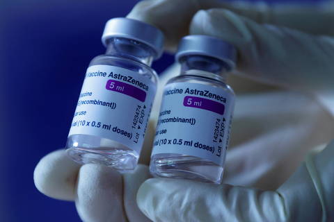 FILE PHOTO: A doctor shows vials of AstraZeneca's COVID-19 vaccine in his general practice facility, as the spread of the coronavirus disease (COVID-19) continues, in Vienna, Austria May 13, 2021.  REUTERS/Leonhard Foeger/File Photo ORG XMIT: FW1
