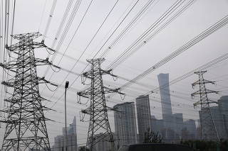Electricity transmission towers near Beijing?s Central Business District (CBD)