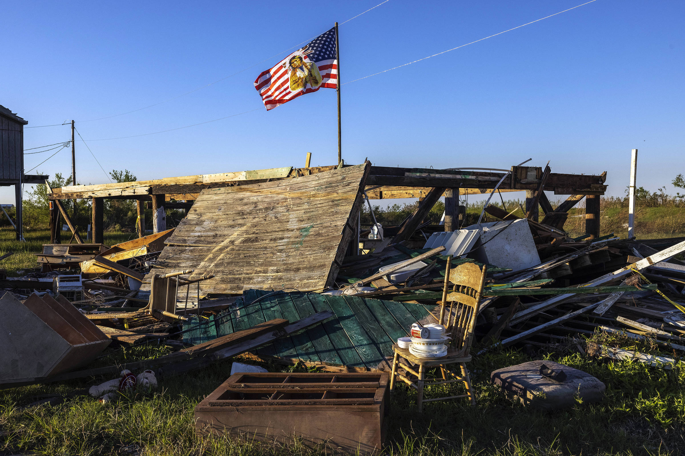 Debris from the home of Benny Dardar, resident of Jean Charles Island off the coast of Louisiana, severely impacted by Hurricane Ida