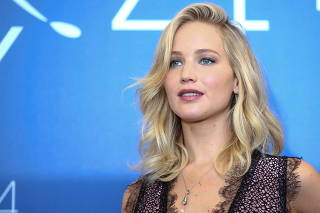 FILE PHOTO: Actor Jennifer Lawrence poses during a photocall for the movie 