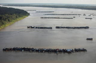 Gold rush draws hundreds of dredging rafts on the Madeira river in Autazes