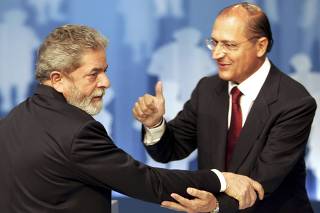 Opposition presidential candidate Alckmin greets Brazil's President Lula da Silva before a television debate in Sao Paulo