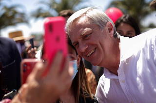 FILE PHOTO: Chilean presidential candidate Jose Antonio Kast meets with supporters in Santiago