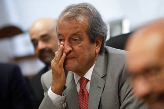 Brazil's Liberal Party President Valdemar Costa Neto gestures during a meeting with parliamentarians from his party in Brasilia