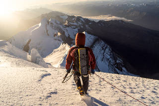 A photo provided by Uisdean Hawthorn shows his partner Ethan Berman descending just below the summit of Mount Robson in Canada on Oct. 2, 2020. (Uisdean Hawthorn via The New York Times)