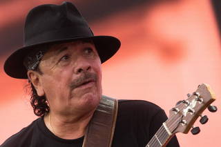 Singer Carlos Santana performs during the 