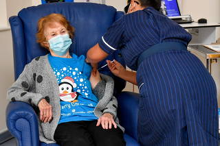 Margaret Keenan, 90, is the first patient in Britain to receive the Pfizer/BioNtech COVID-19 vaccine at University Hospital in Coventry