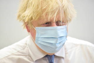 FILE PHOTO: British Prime Minister Boris Johnson visits a vaccination centre in Westminster