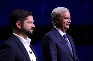 FILE PHOTO: Chilean presidential candidates take part in a live televised debate in Santiago