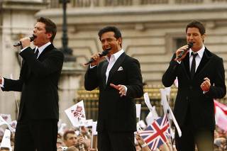 Il Divo perform after the screening of the official handover of the Beijing Olympic Games to London in front of Buckingham Palace in London