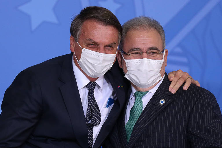 O presidente Jair Bolsonaro e o ministro da Saúde Marcelo Queiroga, durante evento de sanção de projeto de lei que amplia o Teste do Pezinho no SUS, no Palácio do Planalto