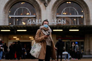 People arrive at Paris Gare de Lyon Railway station ahead of Christmas