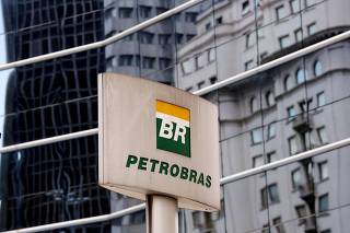 FILE PHOTO: The Petrobras logo is seen in front of the company's headquarters in Sao Paulo