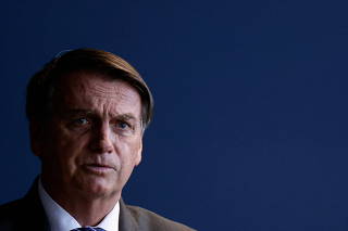 FILE PHOTO: Brazil's President Jair Bolsonaro speaks during a ceremony of a public security program at the Justice Ministry headquarter in Brasilia