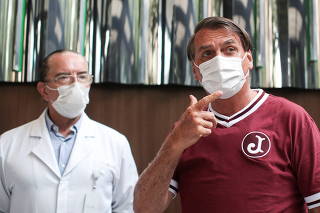 Brazil's President Jair Bolsonaro leaves Vila Nova Star Hospital, where he was treated due to obstructed intestine, in Sao Paulo