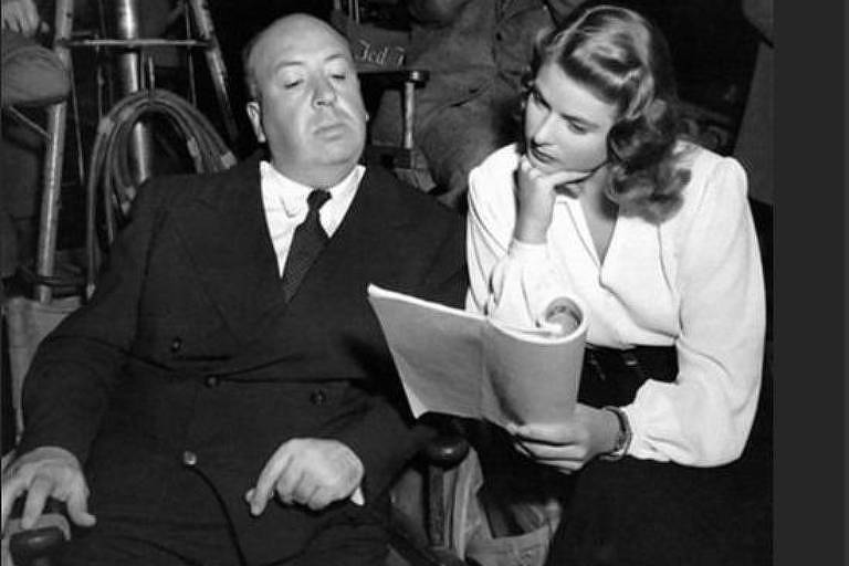 A atriz Ingrid Bergman e o diretor Alfred Hitchcock  no set de "Interlúdio"