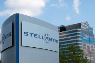 FILE PHOTO: A Stellantis sign is seen outside its headquarters in Auburn Hills,