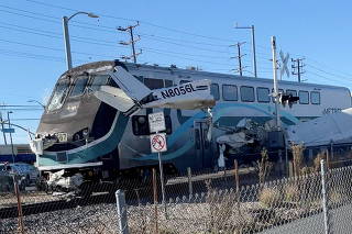 A train hits an aircraft that crashed on railway tracks in Los Angeles