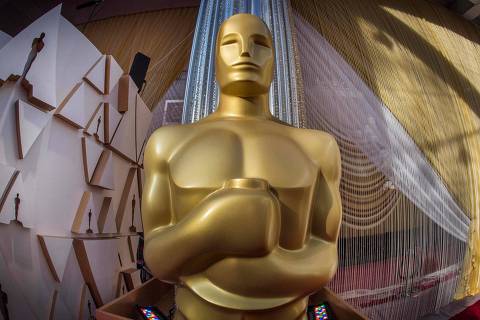 (FILES) In this file photo taken on February 08, 2020 an Oscars statue is displayed on the red carpet area on the eve of the 92nd Oscars ceremony at the Dolby Theatre in Hollywood, California. - The Oscars will have a host for the first time since 2018, broadcaster ABC said January 11, 2022, after television ratings for film's biggest night have plummeted in recent years. (Photo by Mark RALSTON / AFP)