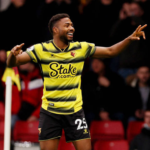 Soccer Football - Premier League - Watford v West Ham United - Vicarage Road, Watford, Britain - December 28, 2021 Watford's Emmanuel Dennis celebrates scoring their first goal Action Images via Reuters/Andrew Couldridge EDITORIAL USE ONLY. No use with unauthorized audio, video, data, fixture lists, club/league logos or 'live' services. Online in-match use limited to 75 images, no video emulation. No use in betting, games or single club /league/player publications.  Please contact your account representative for further details.