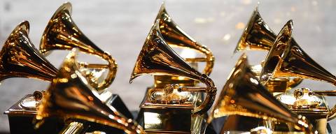 (FILES) In this file photo taken on January 28, 2018 Grammy trophies sit in the press room during the 60th Annual Grammy Awards in New York. - The organization behind the Grammys on January 5, 2022 postponed the music awards gala scheduled for January 31 due to 