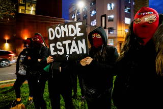 People take part in a rally to mark the International Day of the Disappeared in Valparaiso