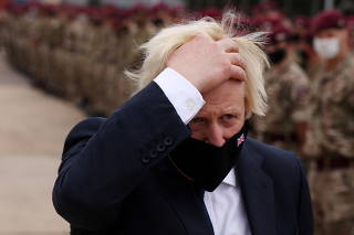 Britain's PM Boris Johnson visits British military personnel who worked on Afghan evacuation, in Colchester
