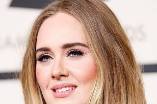 FILE PHOTO: FILE PHOTO: Adele arrives at the 58th Grammy Awards in Los Angeles