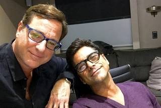 Bob Saget, left, in with John Stamos during production of ÒFuller HouseÓ in 2020. (John Stamos via The New York Times)