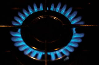 FILE PHOTO: A gas burner is pictured on a cooker in a private home in Bordeaux