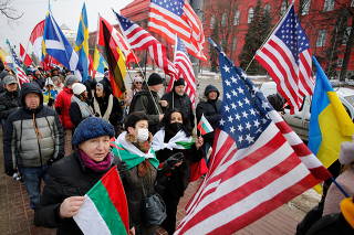 Members of the international community hold a rally in support of Ukraine in Kyiv