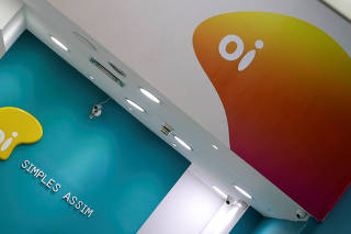 The logo of Brazilian telecoms company Oi SA is pictured inside a store in Sao Paulo