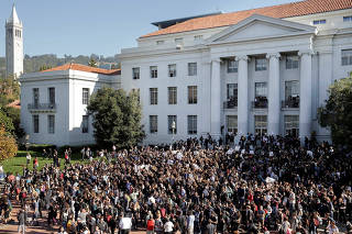 Berkeley High School students begin to march after assembling in front of Sproul Hall on the UC Berkeley campus in protest to the election of Republican Donald Trump as President of the United States in Berkeley, California