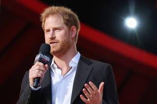 FILE PHOTO: Britain's Prince Harry vows to finish late mother Diana's HIV work