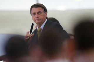 Brazil's President Jair Bolsonaro speaks during a ceremony at the Planalto Palace in Brasilia