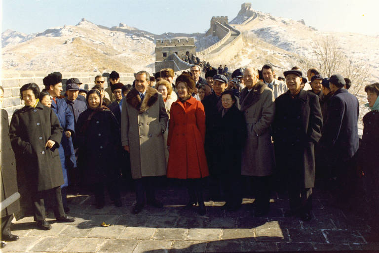 President Nixon and Pat Nixon, Pat Nixon, William Rogers, Chinese officials, Pat Buchanan, Oliver Atkins, Ron Walker, and entourage at the Ba Da Ling portion of the Great Wall. February 24, 1972. WHPO 8548-26A