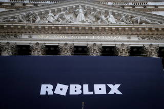 FILE PHOTO: The Roblox logo is displayed on a banner, to celebrate the company's IPO at the NYSE is seen in New York