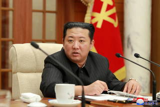 FILE PHOTO: North Korean leader Kim Jong Un attends a meeting of the politburo of the ruling Workers' Party in Pyongyang