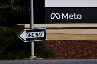 FILE PHOTO: A sign of Meta, the new name for the company formerly known as Facebook, is seen at its headquarters in Menlo Park
