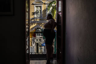 Mariana Donato, a member of a dance troupe, takes a break from her dance classes in Recife, Brazil on Nov. 6, 2021. (Dado Galdieri/The New York Times)