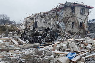 A view shows a destroyed building in a residential area in Zhytomyr