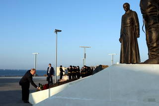 Russia's President Vladimir Putin visits a monument on Unity Day in Sevastopol