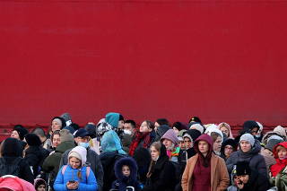 People fleeing from Ukraine to Romania arrive at Isaccea border crossing