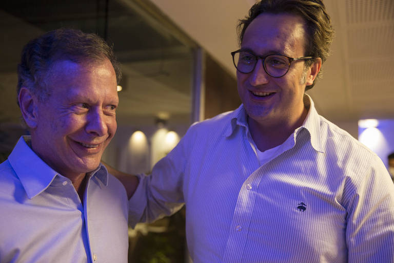 O empresário e sócio do grupo Esfera João Camargo e o sócio diretor da XP Investimentos Rafael Furlanetti